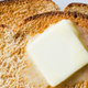 Pat of butter melting on toast